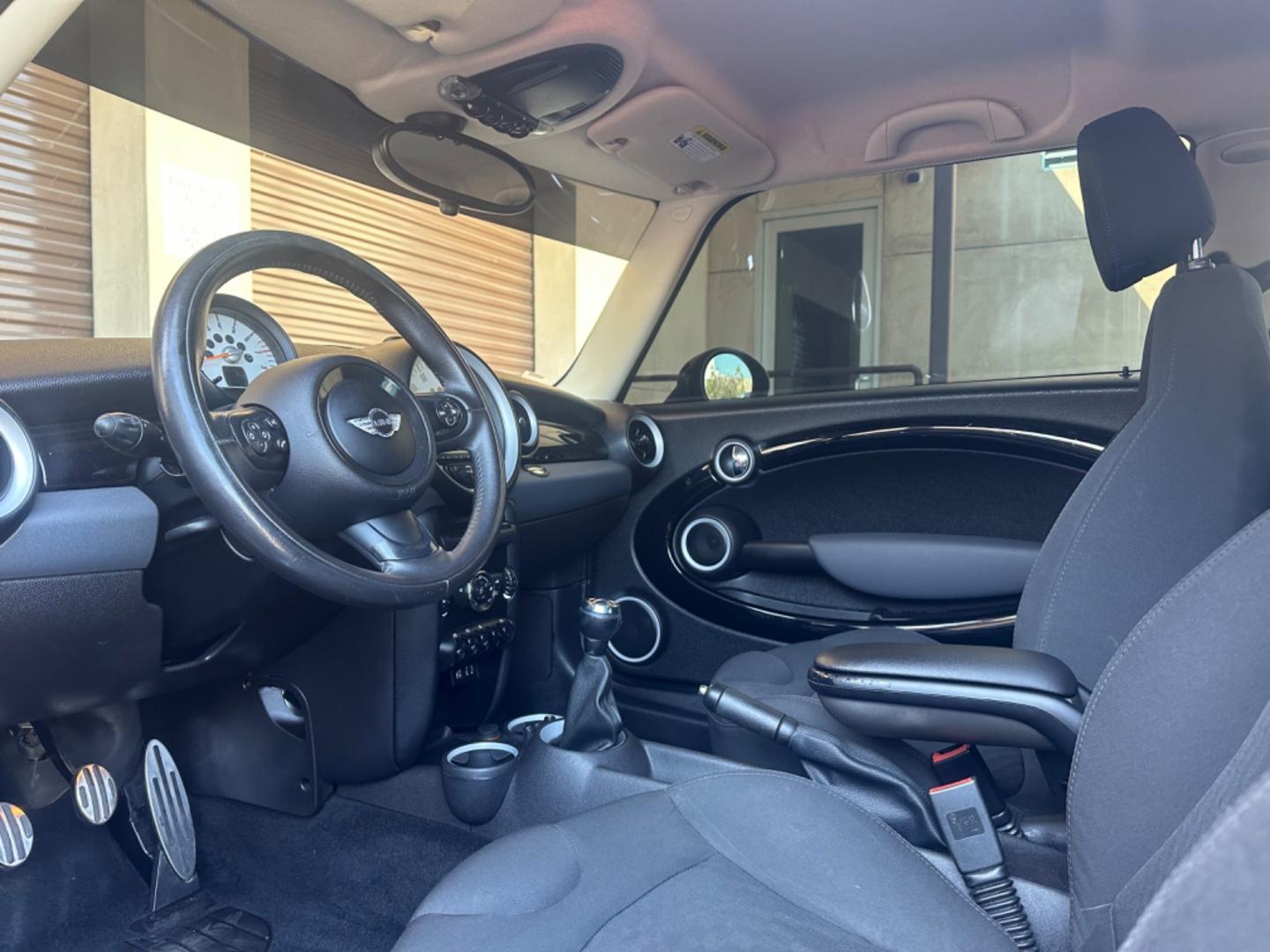 2012 Black /Black Mini Cooper Cloth (WMWSV3C52CT) with an 4Cylinder engine, Manual transmission, located at 30 S. Berkeley Avenue, Pasadena, CA, 91107, (626) 248-7567, 34.145447, -118.109398 - Tank : 13.20 Anti-Brake System : 4-Wheel ABS Steering Type : Rack & Pinion Front Brake Type : Disc Rear Brake Type : Disc Turning Diameter : 35.10 Front Suspension : Ind Rear Suspension : Ind Front Spring Type : Coil Rear Spring Type : Coil Tires : 195/55R16 Front Headroom : 38.80 Re - Photo#11